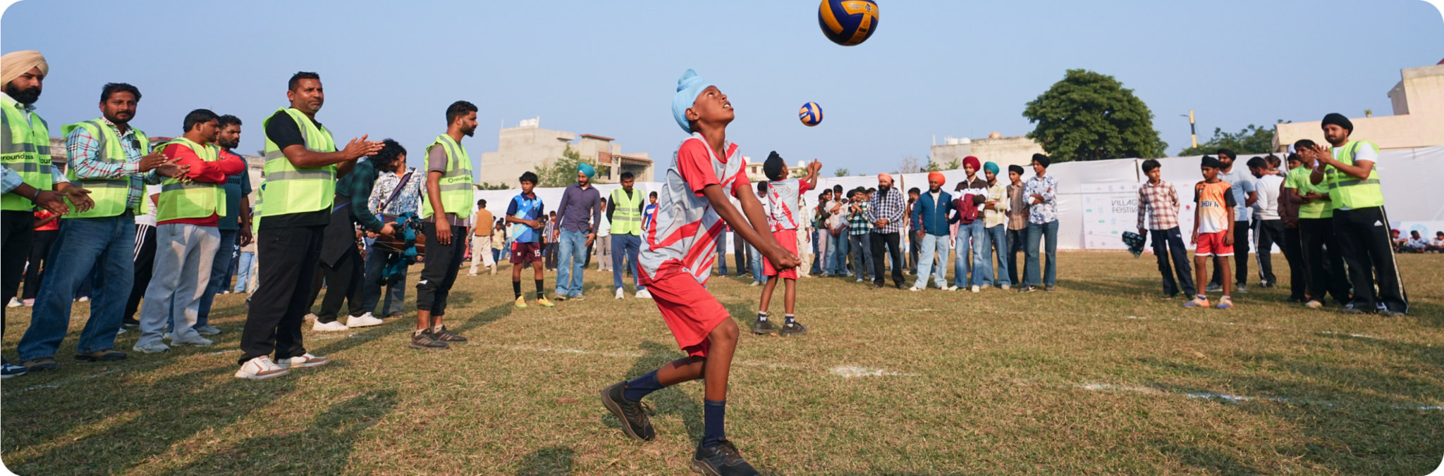 Volleyball and community at a Punjab village sports field
